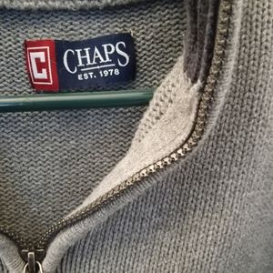 Men's XXL made from chaps established 1978 is the gray and it has a zipper.